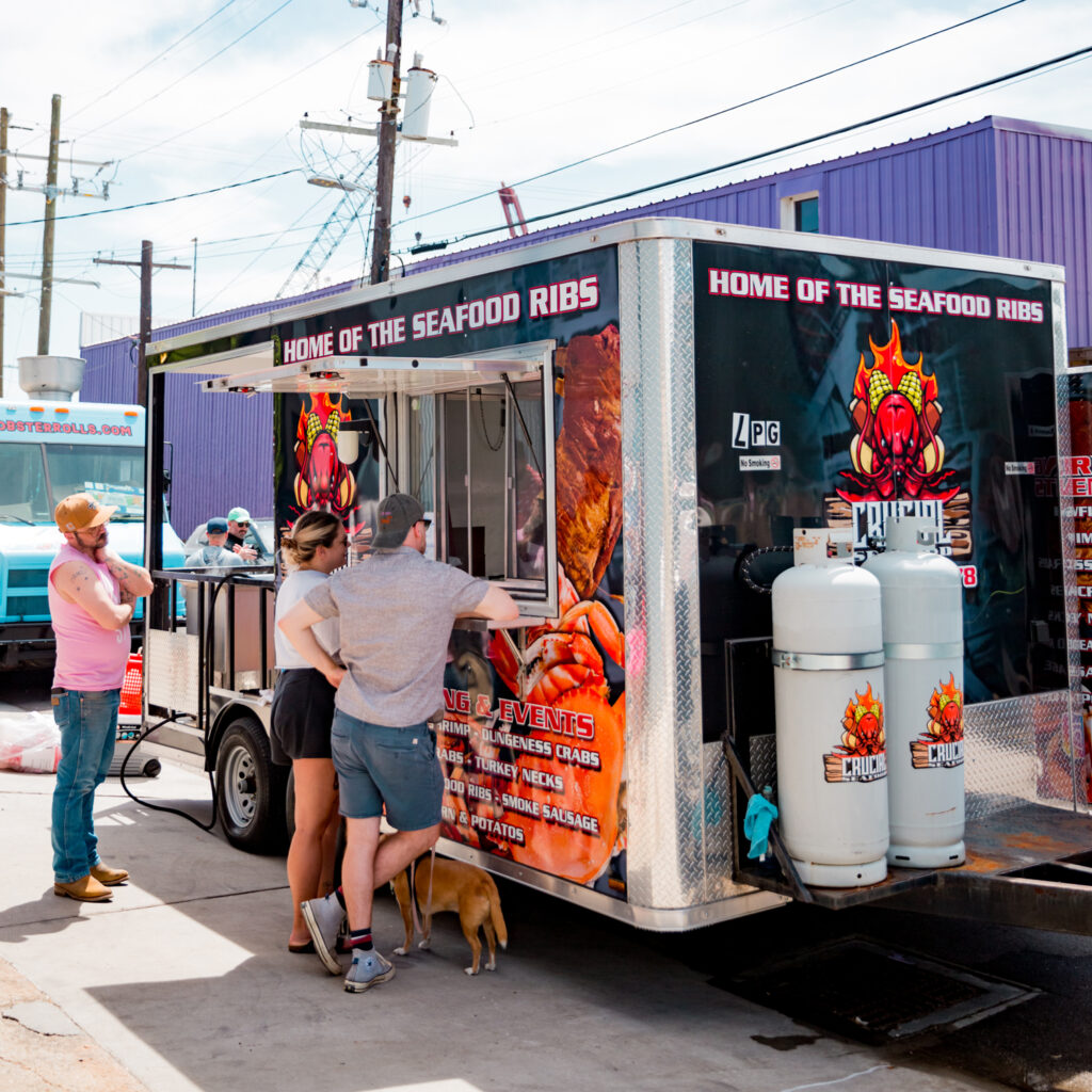 Crucial seafood truck parked at Miel Brewery